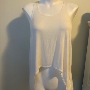 Small white adidas tank top​​​​​​​​​​​​